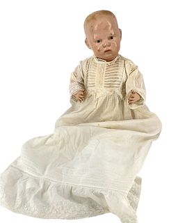 Schoenhut all wood baby. 15" doll with carved and molded head, painted hair and facial features, on five piece bent limb baby body marked with a decal