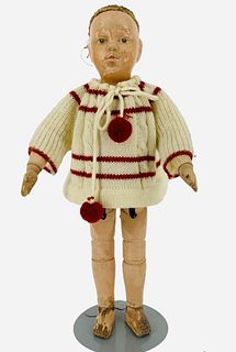 Schoenhut all wood character child. 14" doll with carved and molded head, original wig base nailed on, painted facial features, intaglio eyes, on spri