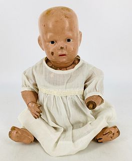 Schoenhut all wood baby. 14" doll with carved and molded head, painted hair and facial features, on five-piece bent limb baby body marked with a decal
