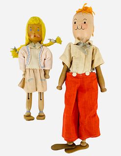 Pair Schoenhut Pinn Family dolls. Includes 12 1/2" boy and 9" girl, both all wood with clothespin legs and yarn hair.