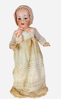 Hertel, Schwab & Co. 151 bisque socket head character baby. 21" doll with solid dome head, molded and painted hair and facial features, glass sleep ey