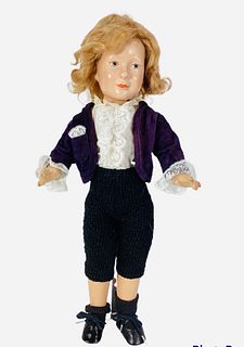 Unmarked Effanbee composition boy. 17" doll with molded and painted facial features, mohair wig, on five-piece body. Doll has overall crazing, redress