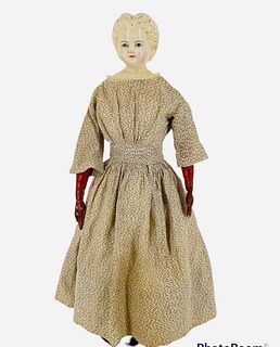 Greiner Papier Mache shoulder head lady. 19" doll with molded and painted blonde hair and facial features, on stitch jointed cloth body with red leath