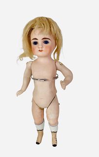 7" German all-bisque doll with mohair wig and blue stationary eyes. Pinky finger is chipped. Pate is glued and not removed. Otherwise, no damage noted