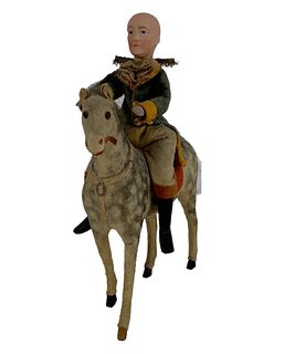 German Candy Container. Bisque head George Washington riding cloth over mache horse. Horse's head opens to reveal that it is a candy container. George