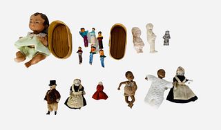 Lot of (17) bisque, porcelain, plastic and metal miniature dolls ranging 3/4" to 3" in length, including (6) Trouble Dolls in a box with the story beh
