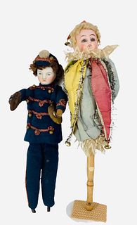 Lot of (2) bisque dolls including 12" socket head band doll playing the symbols doll, has open-closed mouth with painted eyes and facial features and 