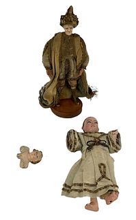 3 antique crÃ‹che figures including 11" man with wax head. Original costume has ornate gold trim and fading overall. 11"child has blown glass eyes and