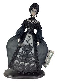 A porcelain Alexandra "Manon" doll, (4/7) 24" with painted facial features. Includes box, tag and COA.