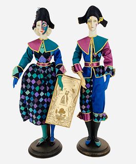 A Pair of Alexandra porcelain "Blue Carnival" (6/25) dolls measuring 16 1/2" & 17" with painted facial features including box, tag and COA.