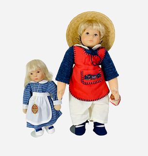 (2) Kathe Kruse painted plastic head dolls. Includes 10" girl with human hair wig, on cloth over wire stockinette body; and 15" boy with human hair wi