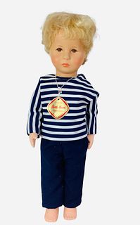 1976 Kathe Kruse boy. 18" doll with fixed plastic head, human hair wig, molded and painted facial features, on cloth body with tab jointed arms and di
