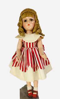 Madame Alexander composition girl. 17 1/2" doll with human hair wig, sleep eyes, closed mouth, on five-piece body. Doll has light overall crazing, eye