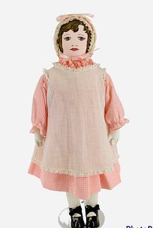 Newer Moravian Cloth Doll. 18" girl with painted hair and facial features, on stitch jointed body. All original costume consists of pink gingham dress