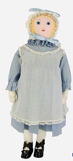Newer Moravian Cloth Doll. 17 1/2" girl with painted hair and facial features, on stitch jointed body. Doll wears blue/white gingham dress with white 