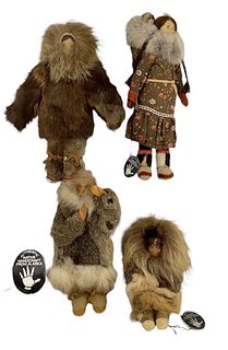 Lot of (4) cloth & wood Alaskan dolls, 11 1/2", 11", 8 1/2" & 6". Painted facial features, and dressed in fur, (3) have tags.