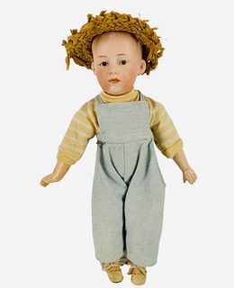 Gebruder Heubach bisque socket head character boy. 10 1/4" doll with solid dome head marked as shown, molded and painted hair and facial features, int