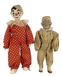 Lot of (2) bisque & porcelain Clowns, 14 1/2" & 13" in height, the large one shows little wear with some paint chipped off shoes, nose & left cheek; a