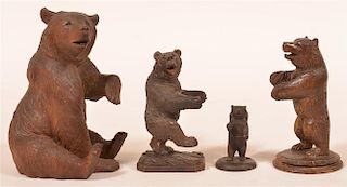Four Vintage Black Forest Carved Bear Figures.