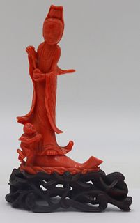 Carved Salmon Coral Figural Grouping.
