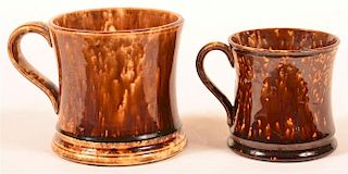 Two Rockingham Glazed Yellowware Mugs.