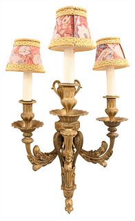 Large Louis XVI Gilt Bronze Sconce, having urn finial over foliate swags above torch form backplate with scrolling candle arms, along with swag and le