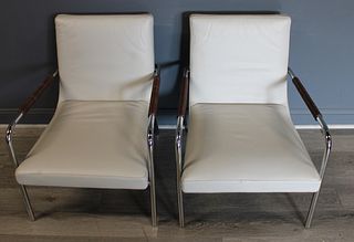Ligne Roset Leather Upholstered Chrome Chairs.