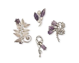 A group of Fred Davis silver and amethyst brooches