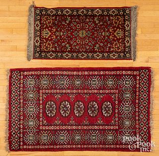 Two semi antique mats