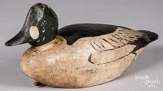 Carved and painted golden eye duck decoy