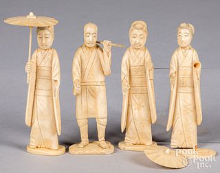 Four Japanese carved ivory figures, early 20th c.