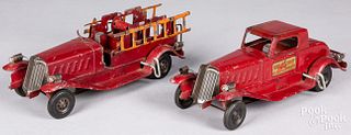 Two Girard pressed steel wind-up fire vehicles
