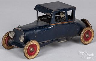 Kingsbury tin wind-up coupe, with driver
