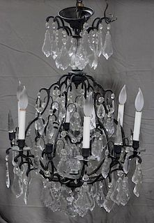 Iron and Crystal Skeleton Form Chandelier.