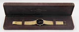 WATCH. 14kt Baume & Mercier Men's Wrist Watch.