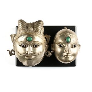 A PAIR OF INDIAN SHIVA AND PARVATI FACE GAURI STYLE SILVER PLATED BRASS WEDDING BOXES, 20TH CENTURY,