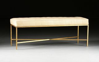 A CONTEMPORARY STYLE BUTTON TUFTED LEATHER AND GILT METAL BENCH,  