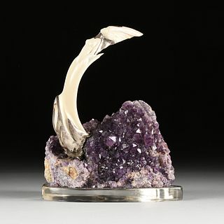 AN EROTIC NUDE ANTLER CARVING ON AN AMETHYST GEODE, 20TH CENTURY,