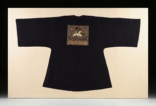 A CHINESE FOURTH RANK CIVIL OFFICIAL'S MIDNIGHT BLUE SILK SURCOAT, PUFU, QING DYNASTY, LATE 19TH/EARLY 20TH CENTURY, 