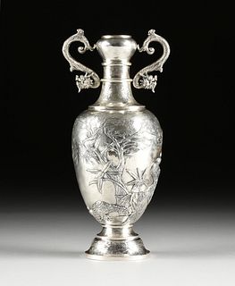 A CHINESE EXPORT SILVER TWO-HANDLED VASE, MARKED WANG HING, AND HONG KONG RETAILER AN CHANG, LATE 19TH/EARLY 20TH CENTURY,