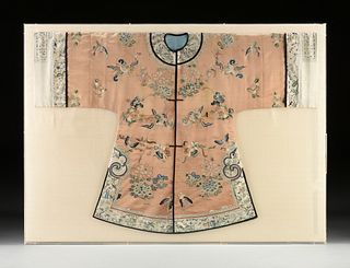 A CHINESE "CARNATIONS AND PLUMS" PINK GROUND SILK INFORMAL ROBE, LATE 19TH/EARLY 20TH CENTURY,