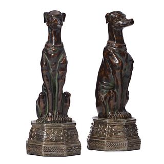 A Pair of Seated Figures of Greyhounds