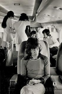 Jim Marshall (American, 1936-2010)      Mick Jagger on Tour Plane