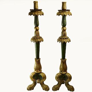 Pair of mid 20th century Italian carved painted and silver gilt candle torchieres.