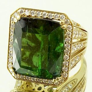 Approx. 22.0 Carat Emerald Cut Tourmaline, 2.0 Carat Diamond and 18 Karat Yellow Gold Ring. Tourmaline with vivid saturation of color. Signed 18K. Rin