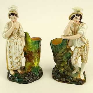 Pair of Jacob Petit Porcelain Figural Scent Bottles. Male and female form. Signed JP on bottom. Both with wear., the stopper on the male figure looks 