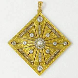 Edwardian circa 1910 Diamond, Pearl and Gold over Platinum Pendant. Set with old European and small rose cut diamonds. Diamonds F-G color, VS-SI1 clar