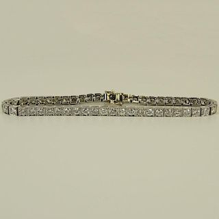 Lady's Approx. 4.75 Carat Round Cut Diamond and Platinum Straight Line Bracelet. Diamonds F-G color, VS clarity. Unsigned. Very good condition. Measur