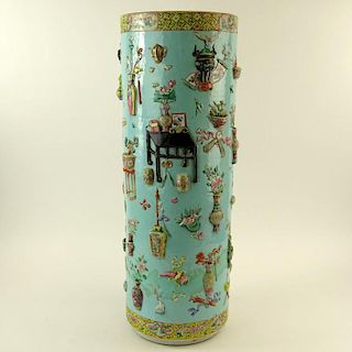 Chinese 19/20th Century Famille Rose Turquoise Ground Umbrella Stand with Relief Decoration. Unsigned. Old restorations otherwise good condition. Meas