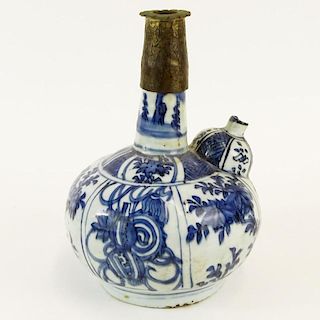 Chinese Ming Dynasty Blue and White Porcelain and Brass Opium Pipe Kendi. Unsigned. Restoration to neck, minor losses. Measures 8-1/2" H x 6-1/4" W. S